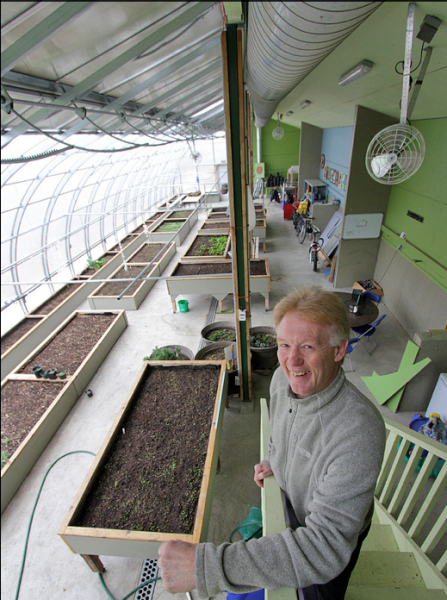 Bill Swan in the greenhouse